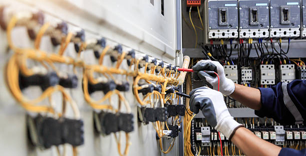 Professional Electrician technician working in Story City, IA